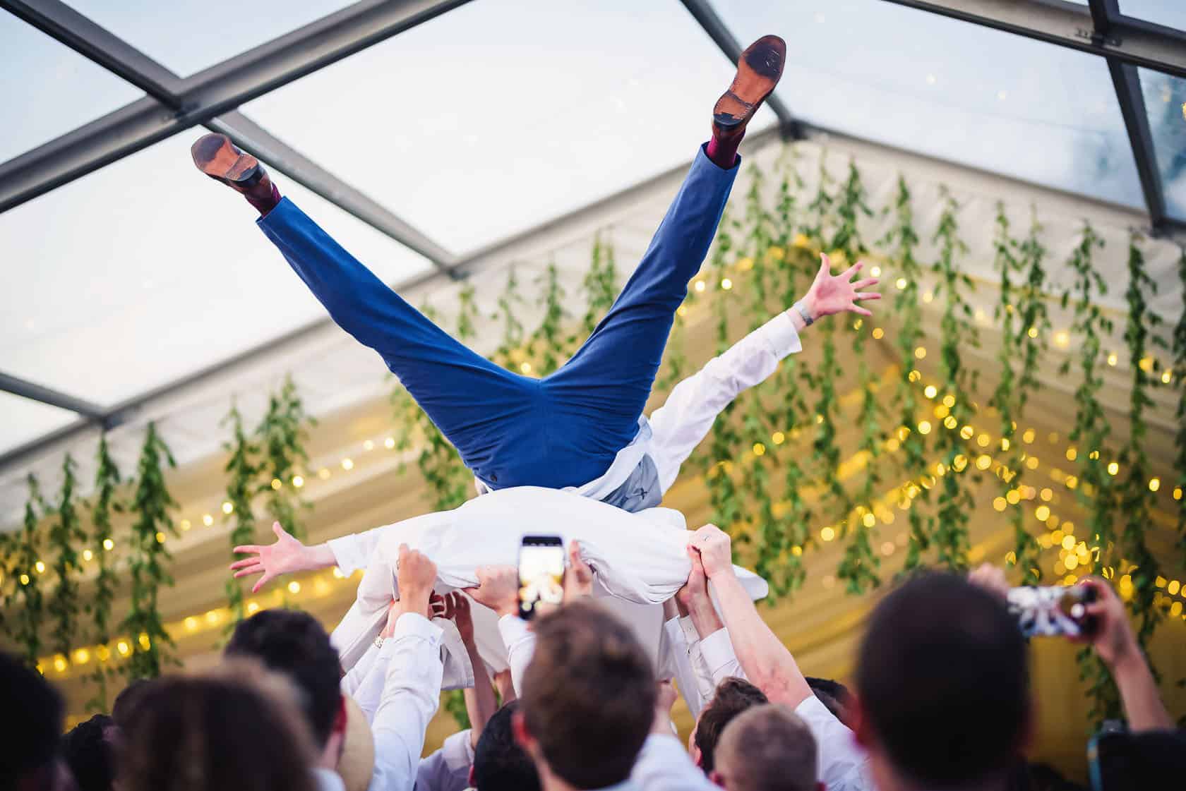 Thomas the groom doing some crowdsurfing